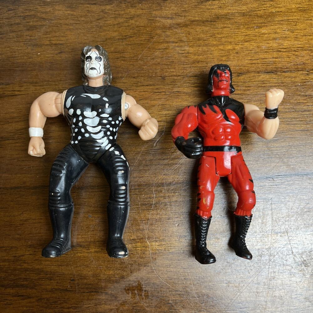 Two (2) 1990s Wrestling Figures. Used As-Is. Moveable Arms And Legs. WWE Style